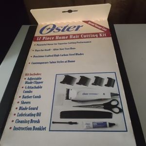 OSTER 12 PIECE HOME HAIR CUTTING KIT. WITH SPECIAL STORAGE CASE.